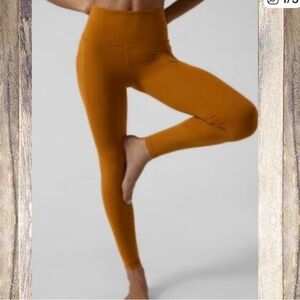 High-Waisted Mustard Leggings athleta 	
Salutation Stash Pocket II Tight 2x